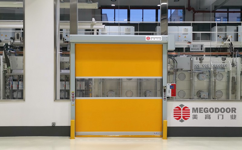 美高隔音防尘快速卷帘门在无锡工厂中的应用优势插图1